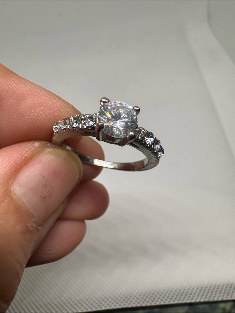 Round Cut CZ Solitaire Ring with Side Stones Silver Tone Size 7